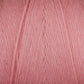 A close-up image of Maurice Brassard Cotton 8/8 Carpet Warp in a ball. The texture of the unmercerized cotton is visible, showing the individual strands twisted together. The color is a soft, muted pink with uniform thickness, perfect for knitting and crochet projects.