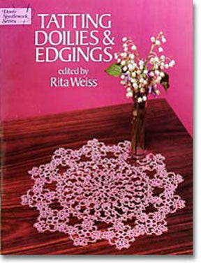 The cover of the Dover Books publication "Tatting Doilies and Edgings" edited by Rita Weiss features an intricate, lacy tatted doily on a wooden table, accompanied by a small vase with white flowers, all set against a pink background.