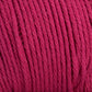 Close-up image of tightly wound Brown Sheep Cotton Fleece yarn. The fibers are neatly aligned and exhibit a soft texture, characteristic of high-quality cotton fleece. The yarn appears to be of medium thickness, perfect for intricate knitting patterns. The color is a rich, deep red.