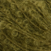 Close-up image of green, curly yarn with a fuzzy texture. The fibers are tightly twisted, creating a dense and intricate pattern characteristic of the Victorian Bouclé Mohair Yarn from Caledonian Dye Works.