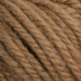 Close-up image of light brown, chunky strands of Halcyon Yarn Classic Rug Wool twisted together, showcasing the soft, fibrous texture that is perfect for weavers. Made by Caledonian Dye Works.