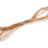 A coiled length of Kromski North America's thin, brown drive band arranged in a figure-eight shape against a white background. The color and texture suggest it is made from natural hemp, ideal for use on your Kromski spinning wheel.