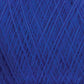 Close-up image of a ball of JaggerSpun Maine Line 2/20 Yarn from Jagger Brothers, Inc., showcasing the texture and intricate crisscrossing pattern of the fibers. The medium grade wool appears soft and fluffy, with various shades of blue creating depth.