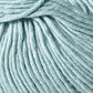 Close-up image of light blue Jo Sharp Soho Summer DK Cotton by Kingfisher Yarn & Fibre, showcasing individual strands and fibers woven together. The texture appears soft and smooth, making it ideal for knitting or crocheting summer projects.