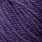 A close-up view of the Halcyon Deco Rug Wool by Caledonian Dye Works reveals the detailed texture and twist of dark purple, 100% wool strands. The fibers appear soft and slightly fuzzy, with the rich color creating a sense of depth and warmth, making it perfect for versatile yarn projects or crafting a stunning Deco rug.