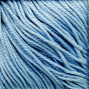 Close-up of soft, light blue Cascade Ultra Pima Cotton Yarn strands neatly arranged. The image highlights the smooth texture and even twist of the yarn fibers, showcasing their uniform color and slight sheen. Perfect for knitting or crochet projects with an incredibly soft hand from Cascade Yarns.