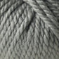 A close-up of tightly wound, thick, gray Jo Sharp Silkroad Ultra yarn. The fibers from Kingfisher Yarn & Fibre are neatly twisted together, forming a textured, braided pattern. The image highlights the chunky cuddly yarn's softness and dense weave—perfect for cozy winter accessories.