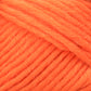 Close-up of Lamb's Pride Bulky Yarn in a vibrant orange, showcasing thick, soft strands with a slightly fuzzy texture. The intertwined fibers create a uniform pattern that highlights the yarn's eye-catching color and cozy appearance, ideal for knitting Icelandic sweaters or crochet felting projects. Made by Brown Sheep.