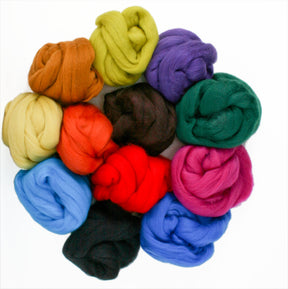 Introducing the Merino Fiber Bag by Halcyon Yarn: A vibrant array of wool roving bundles, ideal for felting, meticulously arranged in a circular pattern. This collection features an array of shades including green, blue, red, yellow, orange, purple, pink, brown, and black. The Merino fiber wool is expertly twisted and piled closely together on a pristine white background.