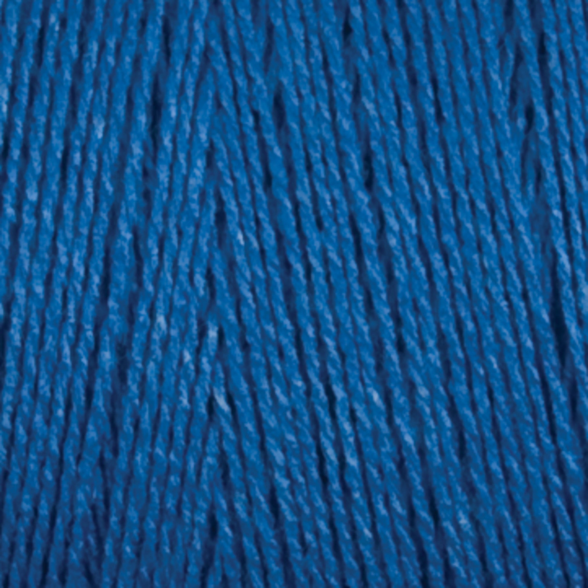 A close-up image of Maurice Brassard's 8/2 Bamboo Yarn Mini-cone in deep blue, showcasing its detailed texture and twisted strands. The yarn looks smooth and tightly wound, with a vibrant solid color perfect for environmentally conscious knitters seeking sustainable options.