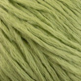 Close-up image of Cumulus Cotton by Juniper Moon Farm soft, green yarn with a slightly fluffy texture. The strands are loosely twisted together in a durable chainette construction, showcasing the smooth and even quality of the fiber. The green hue is light and uniform throughout, providing a calming and natural appearance. This exquisite yarn is brought to you by Knitting Fever under their Euro Yarns collection.