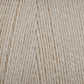 A close-up image showcases Maurice Brassard's 16/2 Bamboo Yarn in beige. The tightly wound strands reveal a smooth and even texture, capturing the fine details of the fibers. This image highlights the yarn's soft, delicate, and sustainable qualities, making it an excellent choice for knitting or crocheting projects.