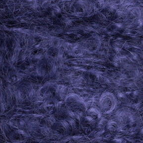 Close-up image of a textured, soft, and fluffy dark purple material from Caledonian Dye Works' Victorian Bouclé Mohair Yarn collection, showcasing fine fibers and curly patterns resembling Mohair Bouclé.