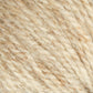 Close-up of Bartlettyarns Maine Wool Yarn in beige, featuring a textured, twisted appearance. This worsted weight yarn blends lighter and darker beige fibers for a natural, cozy look. The detailed texture prominently showcases the fibrous elements and twisted strands characteristic of Bartlettyarns.