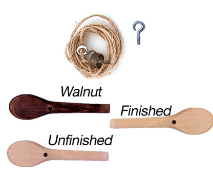 The image shows the Kromski Brake Band Set for Fantasia with Peg by Kromski North America, featuring a bundle of hemp string, a metal hook eye, a metal cylindrical object, and three wooden spools labeled "Walnut," "Unfinished," and "Finished." The "Walnut" spool has a darker color, while the "Unfinished" and "Finished" spools are lighter.