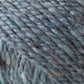 Close-up image of Kingfisher Yarn & Fibre's Jo Sharp Silkroad DK Tweed yarn in blue-green with subtle flecks of darker and lighter hues, highlighting the soft texture and tight twist of the wool, silk, and cashmere fibers.