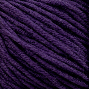 Close-up image of thick, purple Plymouth Select Worsted Merino Superwash yarn strands tightly wound together. The texture appears soft and slightly fuzzy, with visible individual fibers. The twist and thickness of the Plymouth Yarn Co.'s merino yarn are clearly defined, showcasing its rich, deep purple hue.