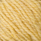 Close-up image of Bartlettyarns' soft, pastel yellow Bartletts Maine Wool - Sport. The texture is fuzzy and twisted, highlighting the tightly wound individual strands. This sport weight yarn in light yellow exudes a warm and gentle appearance.