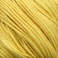 Close-up image of soft, twisted yellow yarn made from Cascade Ultra Pima Cotton Yarn. The texture of the Peruvian Pima Cotton fibers and the tightness of the twists are clearly visible, showcasing the yarn's smooth and even consistency. The bright, cheerful color conveys a warm and sunny feel.