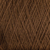 Close-up of dark brown JaggerSpun Maine Line 2/20 Yarn from Jagger Brothers, Inc., showcasing tightly woven fibers that create a textured and intricate pattern. This image emphasizes the natural texture of this medium grade wool, making it ideal for knitting or crocheting projects. The color appears rich and warm, with subtle variations in shade.