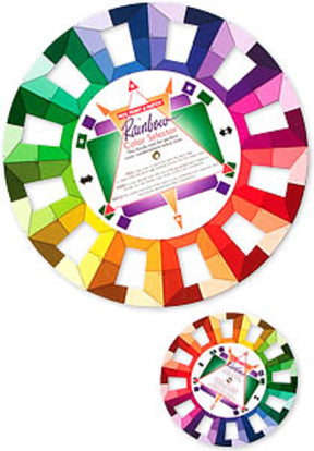 Two multicolored color wheels are depicted. The larger wheel, part of the Pocket Rainbow Color Selector Wheel by Bryson Distributing, Inc., features a spectrum of colors from red to violet around the edge, with a white triangular center displaying text and arrows indicating color relationships and ideal color combinations. The smaller wheel mirrors the larger one, making it perfect for any creative workspace.