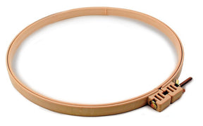 A close-up image of the Morgan 14" No-Slip Hoop by MQP Distribution. The hoop is circular, made of beige plastic, and features an adjustable locking mechanism with a side screw to ensure it holds fabric securely for embroidery or cross-stitching projects.