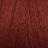 A close-up image of Maurice Brassard's 8/2 Tencel Yarn in soft, dark red. The texture of the yarn strands is clearly visible, displaying a uniform thickness and slightly twisted fibers. The rich and deep color makes it perfect for weaving projects that require a warm and cozy appearance.