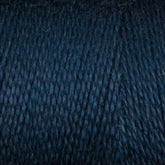 Close-up image of Maurice Brassard's 8/2 Tencel Yarn | Mini Cone in dark blue. The tightly wound threads form a textured pattern, showcasing the fine, individual fibers and creating depth and complexity in the weave, making it perfect for intricate weaving projects.