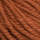 Close-up image of Halcyon Yarn Classic Rug Wool | Skein by Caledonian Dye Works in a warm, earthy brown color. The texture appears fuzzy and plush, with soft, thick, twisted yarn expertly intertwined—a testament to skilled weavers and their exquisite hand-dye techniques.