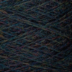 Here's a close-up of JaggerSpun Heather 3/8 by Jagger Brothers, Inc., showcasing an array of beautifully colored wool yarns meticulously wound together. The intricate texture reveals visible fibers and strands in shades of blue, green, purple, along with subtle hints of other hues. This blend creates a complex and detailed pattern that captivates the eye.