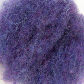 A close-up image of the Harrisville Dyed & Carded Wool Fiber from Harrisville Designs, predominantly showcasing a vibrant purple hue with heathered streaks and interwoven pink fibers. The wool appears soft and fuzzy in texture.