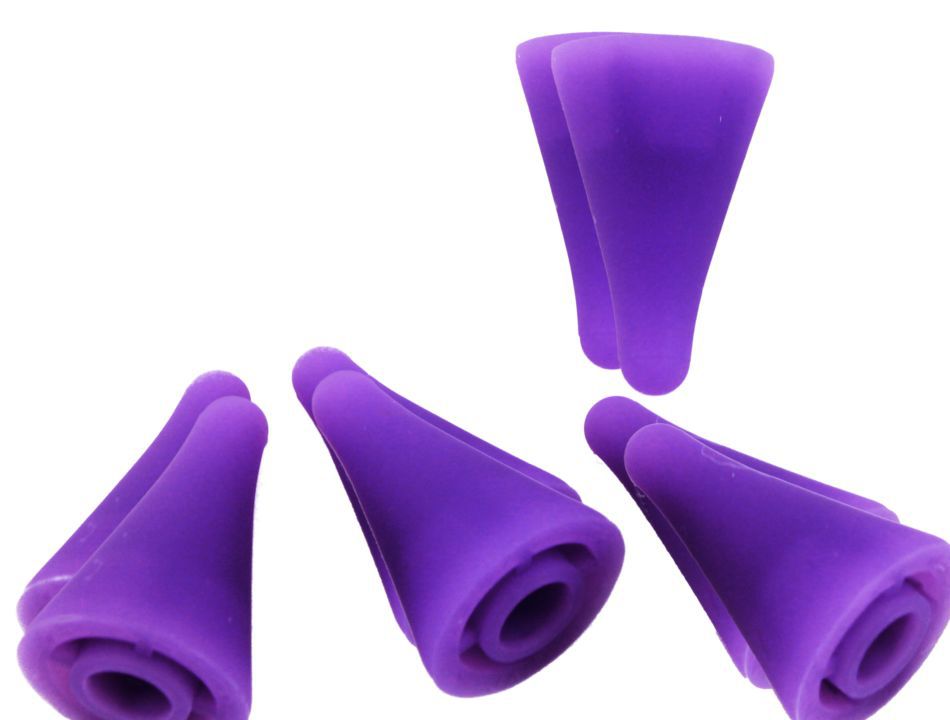 Four purple Needle Tip Protectors from Bryson Distributing, Inc. are arranged on a white background. These conical silicone protectors have a hollow bottom and appear uniform in size. Their smooth surface and design make them ideal for securing stitches while knitting or efficiently managing different needle sizes.