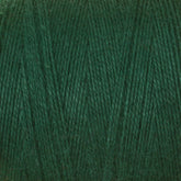 A close-up view of a ball of 8/2 Cottolin Organic Yarn from Maurice Brassard, illustrating the texture and individual strands of the fiber. The yarn, reminiscent of a cotton linen blend, appears soft with a slight sheen, tightly wound into a cylindrical shape, ready for knitting or crocheting projects.