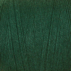 A close-up view of a ball of 8/2 Cottolin Organic Yarn from Maurice Brassard, illustrating the texture and individual strands of the fiber. The yarn, reminiscent of a cotton linen blend, appears soft with a slight sheen, tightly wound into a cylindrical shape, ready for knitting or crocheting projects.