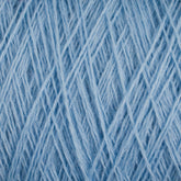 Close-up image of light blue Jagger Brothers, Inc. JaggerSpun Maine Line 2/20 Yarn intricately woven and tangled together, forming a textured, crisscross pattern. The fine strands of this medium grade wool create a soft and fluffy appearance.