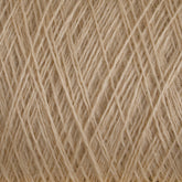 Close-up shot of JaggerSpun Maine Line 3/8 Yarn by Jagger Brothers, Inc., wrapped tightly and crossed in various overlapping directions, creating a textured, woven pattern. The fibers appear natural and slightly coarse.