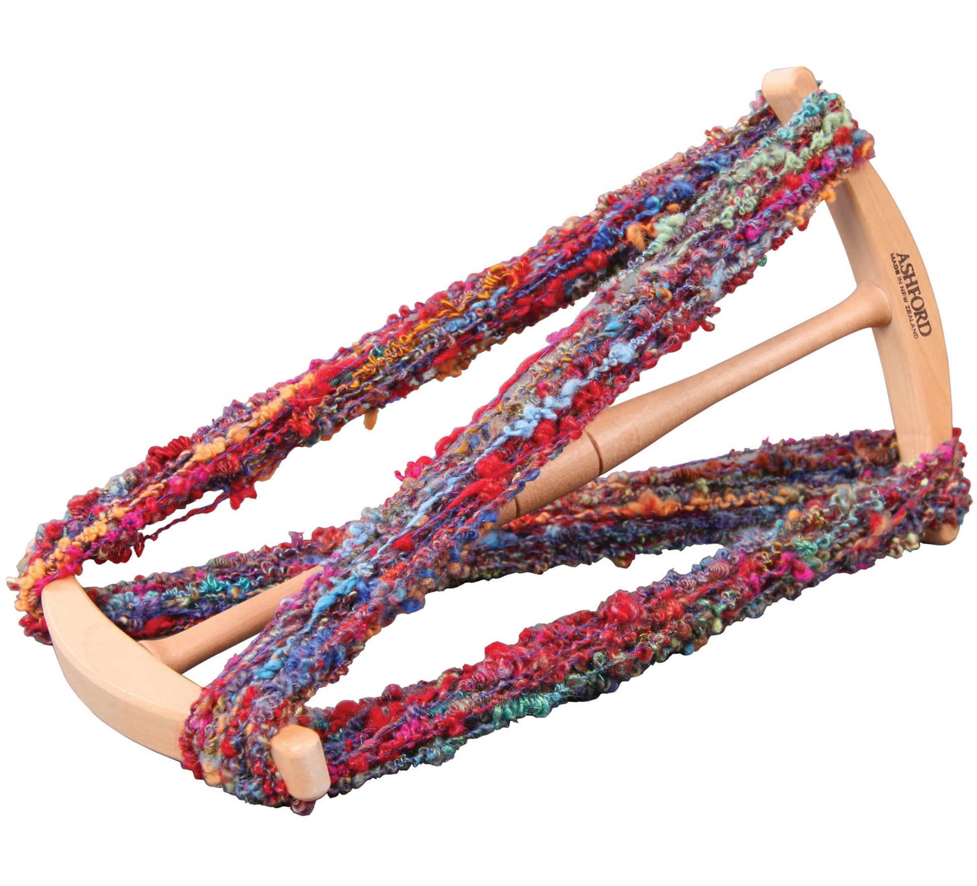 The Ashford Niddy Noddy by Ashford Handicrafts Limited is a traditional wooden tool wrapped with vibrant, textured yarn. Featuring a central handle and 90-degree angled end arms, this niddy noddy showcases various hues in the colorful yarn, creating a lively and multi-colored contrast against the wood.