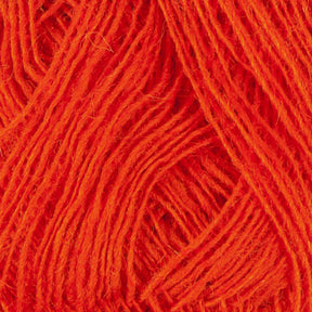 Close-up of Einband Lopi yarn from Berroco, Inc., showcasing its vibrant red fibers intertwining in a textured pattern. The strands vary slightly in thickness, creating a visually rich surface with subtle shadows and highlights reminiscent of Icelandic wool. The image captures a sense of warmth and softness.