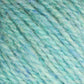 Close-up of a skein of Bartlettyarns' Bartletts Maine Wool - Sport in light turquoise and soft blue hues. The Maine Wool fibers are slightly fuzzy and interwoven, creating a textured appearance. The colors blend smoothly together, giving a calming and soothing effect.