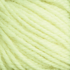 Close-up view of light yellow yarn fibers, showcasing their soft texture and twisted strands. This versatile Halcyon Deco Rug Wool, made from 100% wool by Caledonian Dye Works, appears fluffy and smooth—ideal for knitting or crocheting projects.