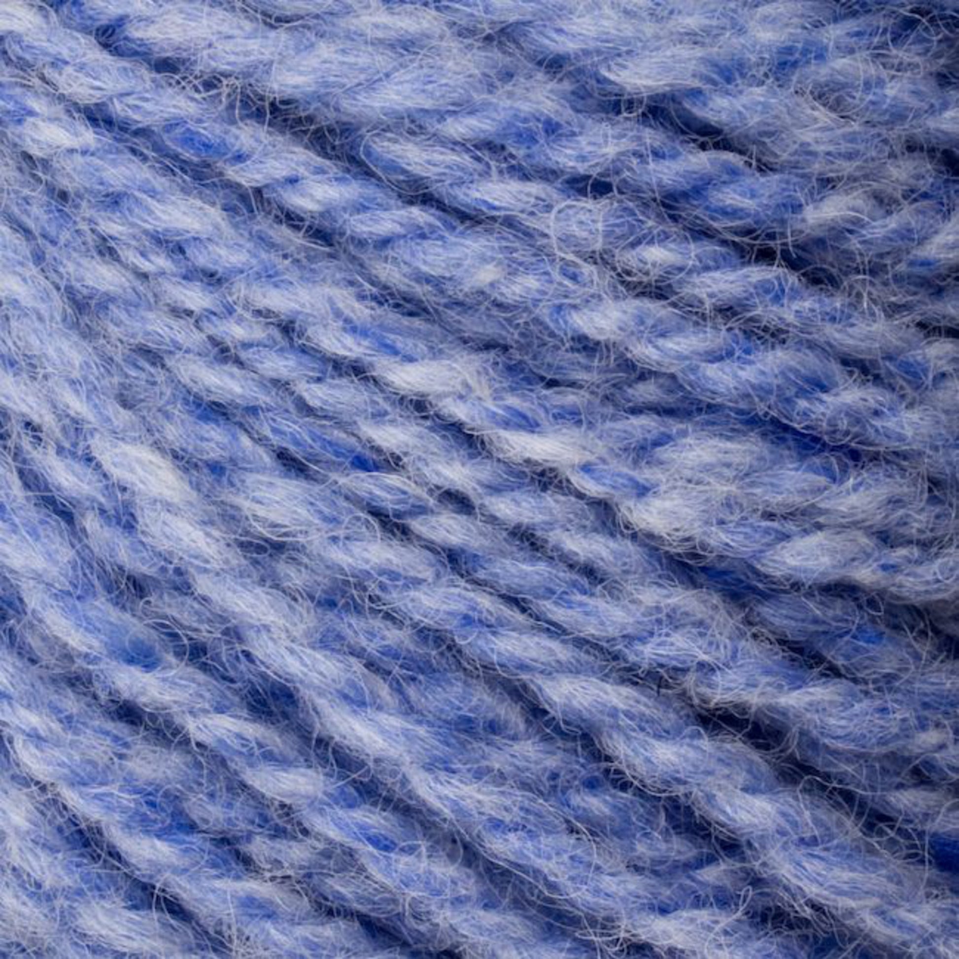 Close-up of a skein of Bartlettyarns' Bartletts Maine Wool - Sport yarn. The yarn, crafted from Maine Wool, features multiple strands twisted together and showcases varying shades of light and medium blue. The texture appears soft and fuzzy.