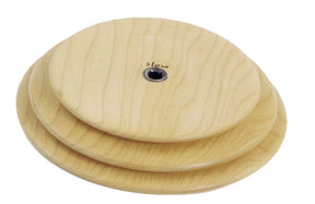 Introducing the Schacht Whorl from Schacht Spindle Co., a set of three nested wooden discs varying in size, stacked one on top of the other. The smallest disc features a black screw at its center with the word "slow" written near it. Crafted from light-colored wood and finished smoothly, this elegant set is both functional and beautiful.