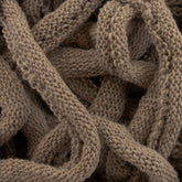 Close-up view of a pile of Harrisville Potholder Loops - Traditional Size Mini Pack from Friendly Loom, intertwined together, showcasing the texture and pattern reminiscent of work produced on a traditional loom. The loops have a soft and fuzzy appearance.