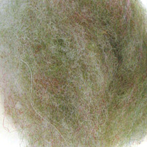 A close-up image of a tangled mass of fibrous material. The fibers, resembling Harrisville Designs' Harrisville Dyed & Carded Wool Fiber, are a mix of various colors, predominantly green with hints of red and white, creating a dense and intricate texture. The material appears fuzzy and intertwined.