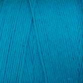 Close-up of a skein of Medium Cotton 16/8 Mop Yarn by Maurice Brassard. The yarn, made from sturdy cotton, is neatly wound, prominently showing its texture and strands. Perfect for knitting or weaving, the vibrant blue color is consistent throughout the skein.