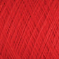 Close-up view of a tightly wound ball of vibrant red JaggerSpun Maine Line 3/8 Yarn | Mini-cone by Jagger Brothers, Inc. The fibers create a textured pattern of intersecting lines, highlighting the intricate weaving and soft, fibrous material throughout the image.