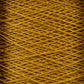 Close-up view of a mini-cone of golden yellow 10/2 Pearl Cotton Yarn by Supreme Corp., showcasing densely woven strands crisscrossing in a neat, uniform pattern. The texture of the yarn is clearly visible, highlighting its fine, smooth nature and exceptional colorfastness.
