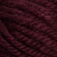 Close-up of thick, dark burgundy Halcyon Yarn Classic Rug Wool | Skein by Caledonian Dye Works, showcasing its slightly fuzzy texture and intricately twisted strands in detail. The rich color and fibrous appearance emphasize the material's warmth and softness, making it ideal for knitting or crocheting projects. This rug wool is perfect for weavers seeking high-quality hand-dye options.