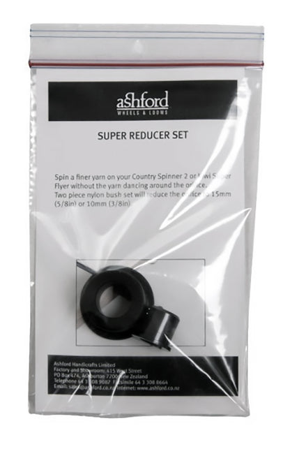 A plastic bag labeled "Ashford Super Reducer Set" from Ashford Handicrafts Limited contains a cylindrical black object designed for yarn spinning, compatible with the Country Spinner 2. The bag features text detailing the set's purpose and contact information for Ashford Handicrafts Limited, based in New Zealand.