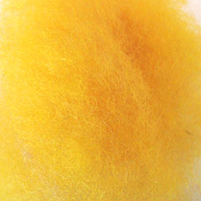 Close-up of a fluffy, yellow material with a soft, fibrous texture. The image is dominated by shades of bright yellow, with subtle variations in tone throughout the fibers, evoking the look of Harrisville Designs' Harrisville Dyed & Carded Wool Fiber.